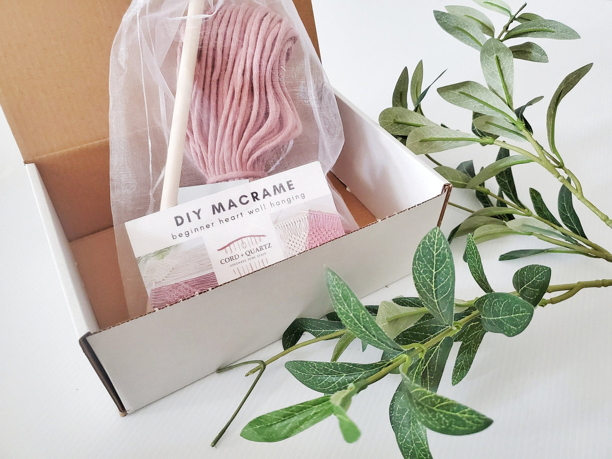 Beginner macrame heart wall hanging DIY craft kit.