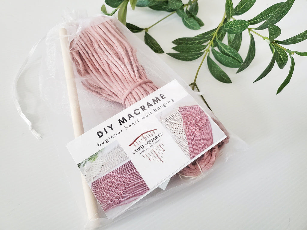 Beginner macrame heart wall hanging DIY craft kit.